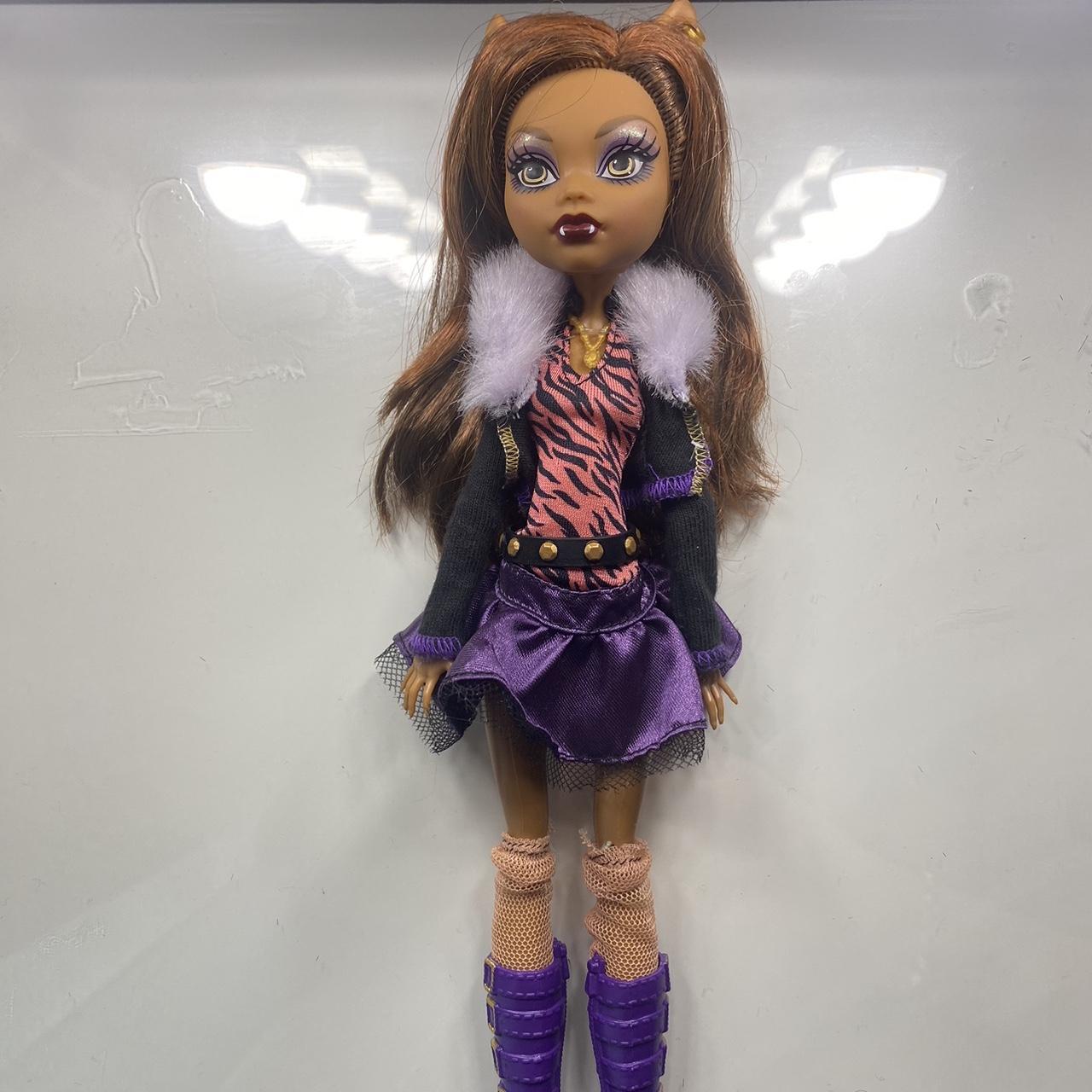 Clawdeen Wolf doll- no pet or stand. Earrings,... - Depop