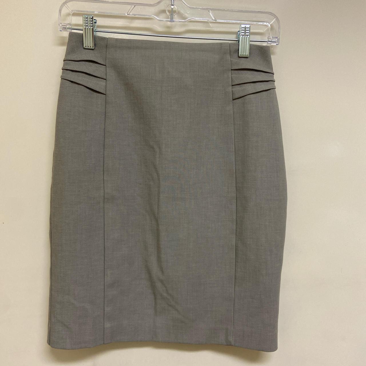 midi express grey skirt small slit and zipper on. Depop