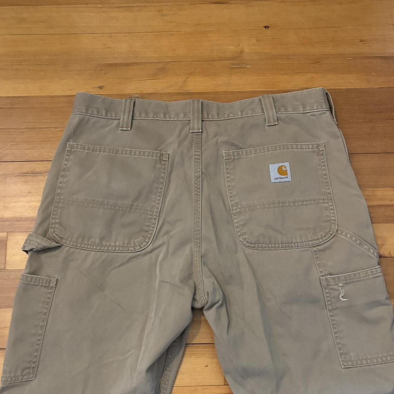 34x30 tan carhartt carpenter pants. good condition... - Depop