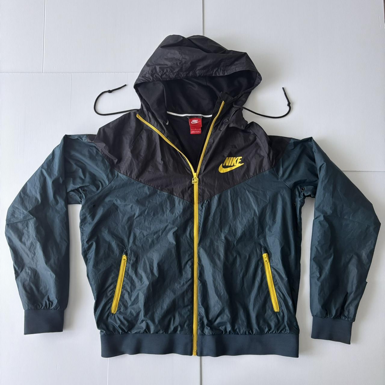 green and black nike windbreaker