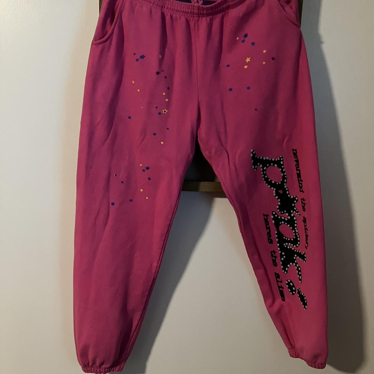 Sp8der Pink sweatpants with with writing down