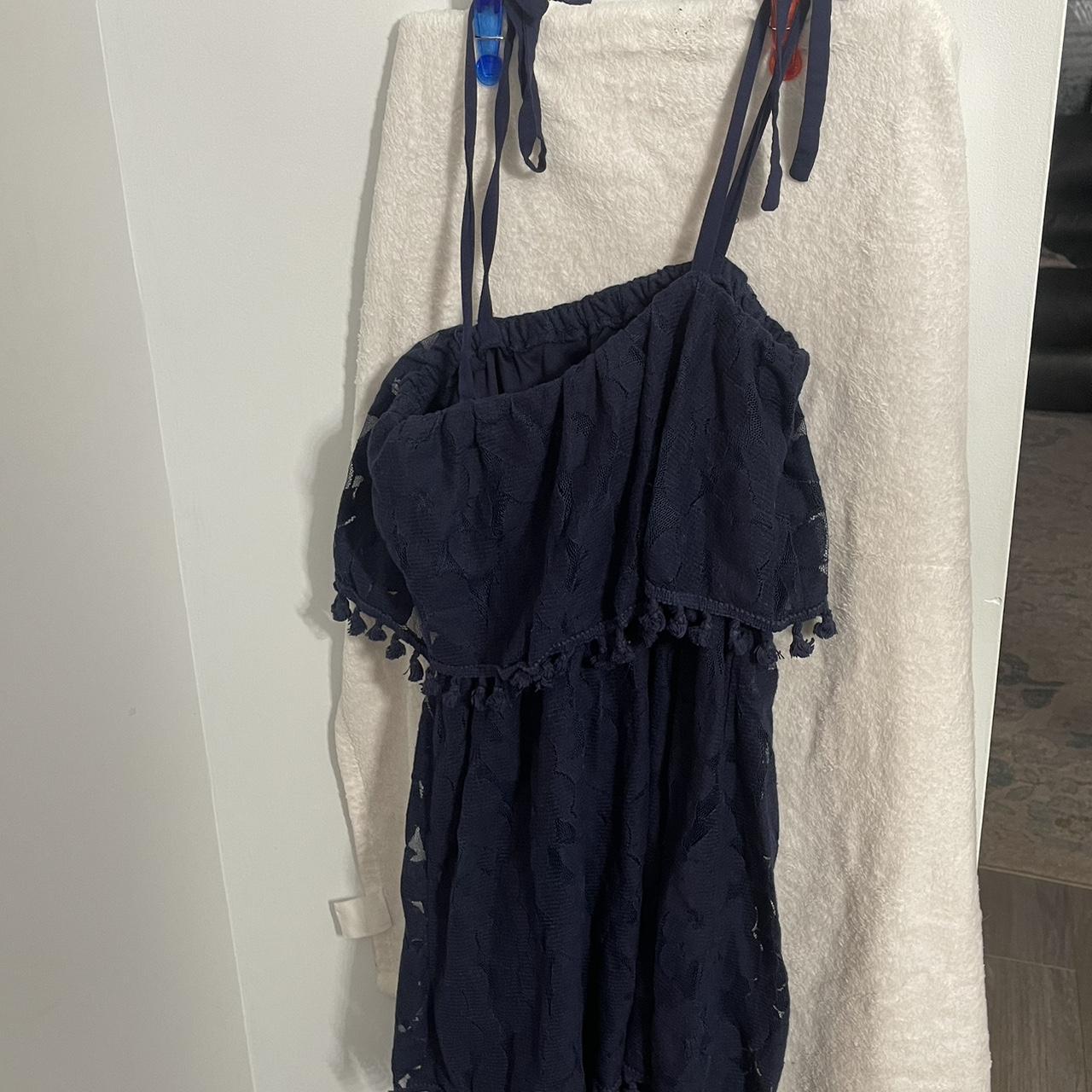 This cute little navy dress has fringe hanging from... - Depop