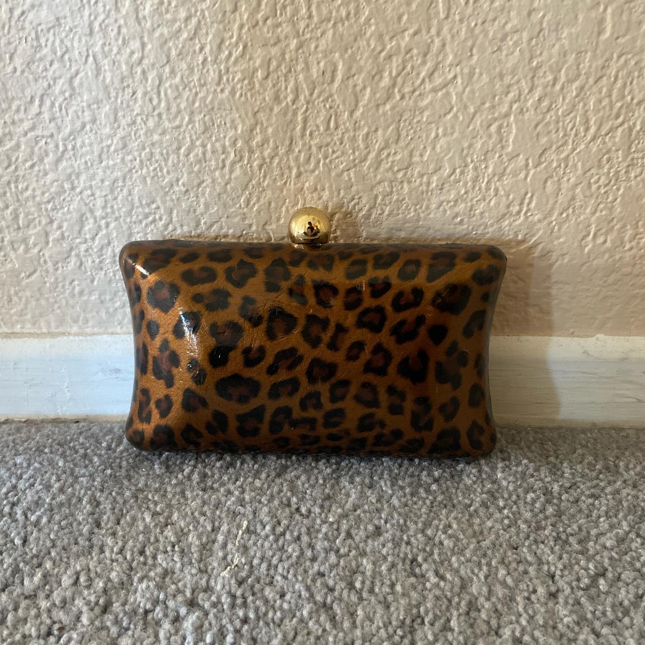 Aldo best sale leopard clutch