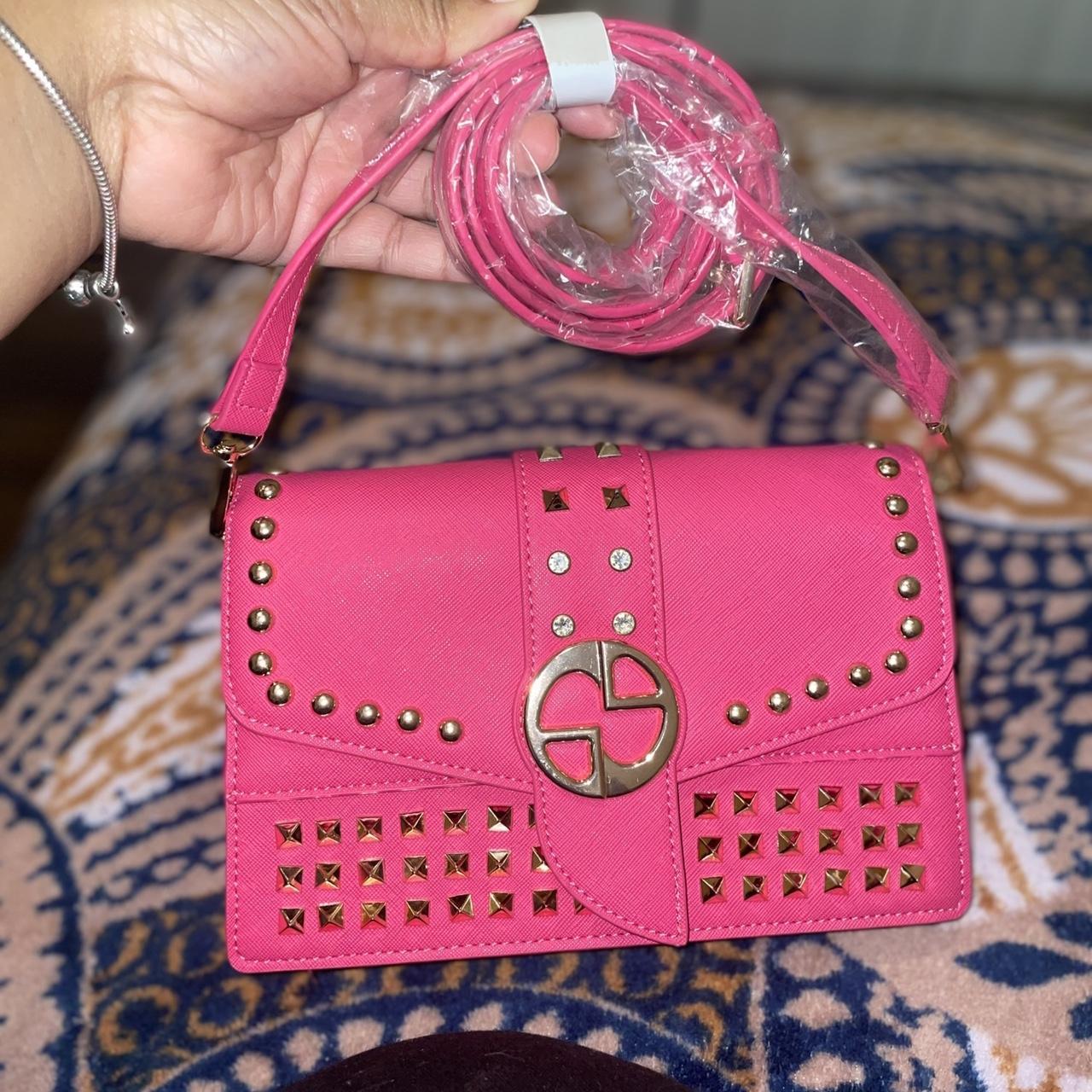 Pink purse with Gold hardware. Never used the purse Depop