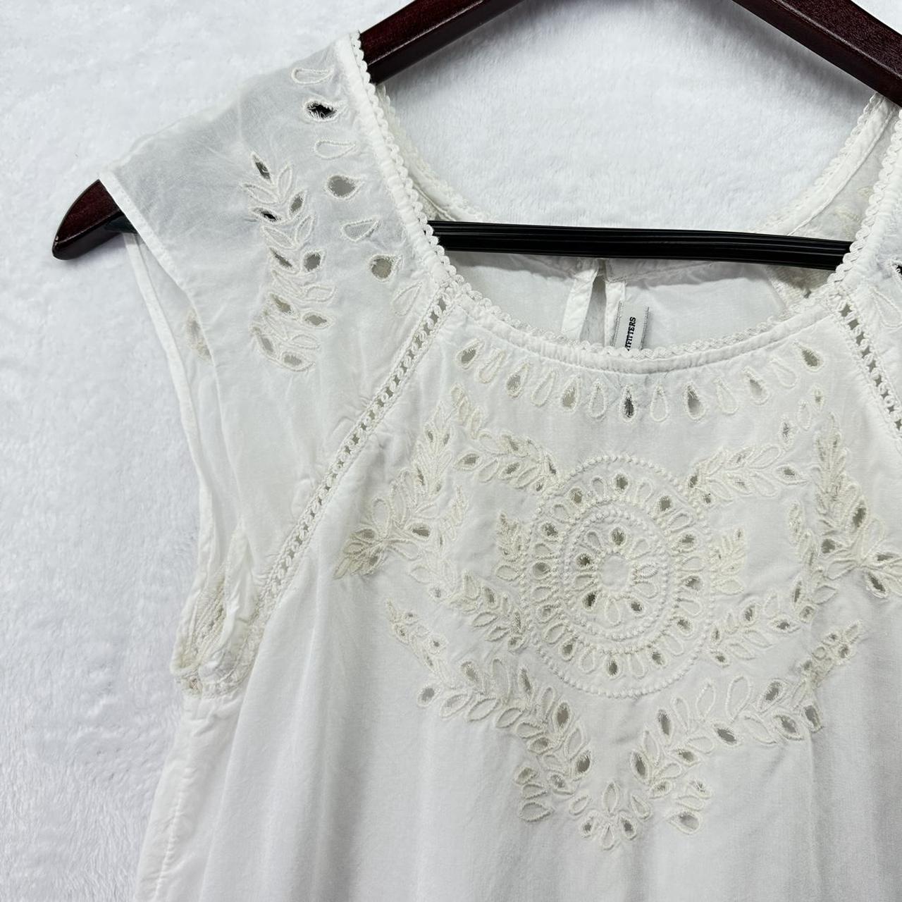 Sheer embroidered mini dress in white by American...