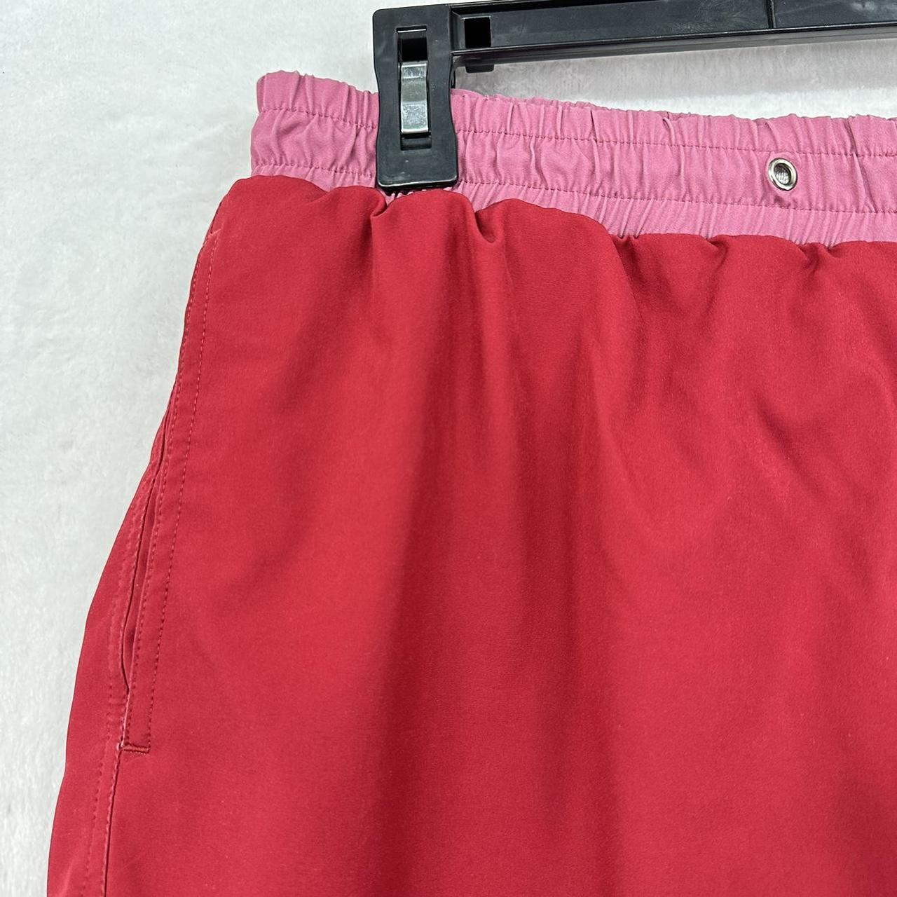 Red and pink slunks swim shorts. Features pockets,... - Depop