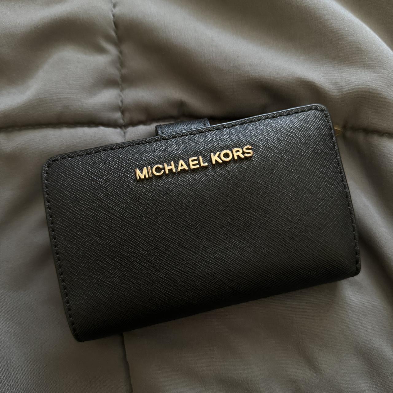Small black MK wallet/card holder with gold lettering Depop