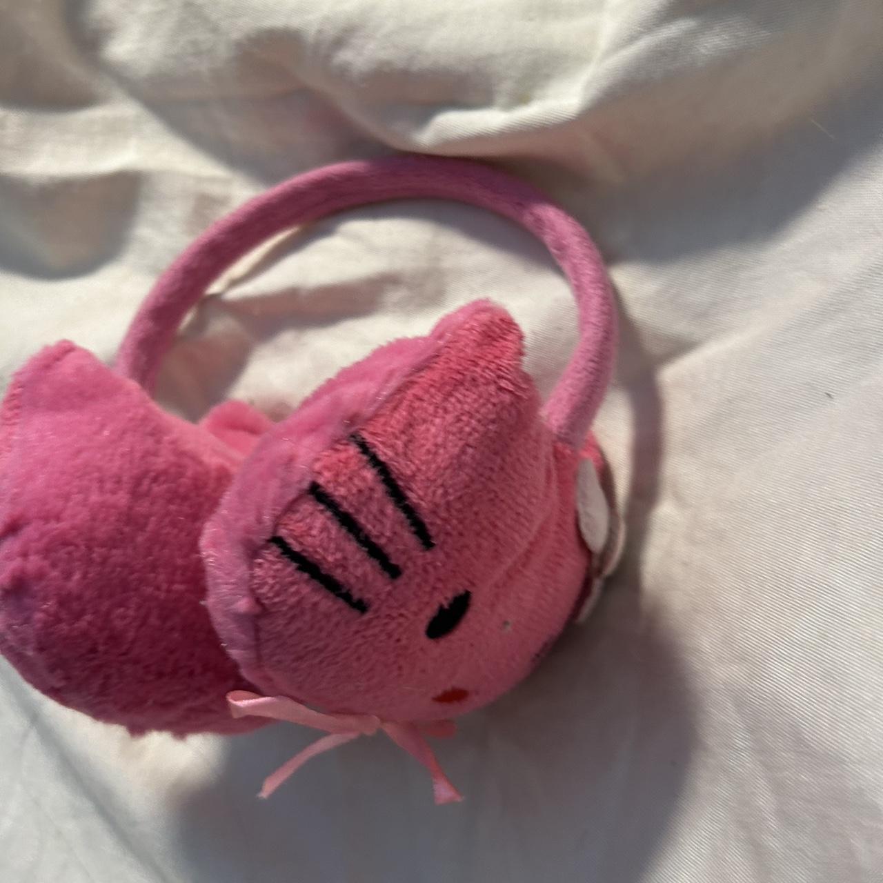hello kitty ear muffs ^_^ cat pictured! i think... Depop