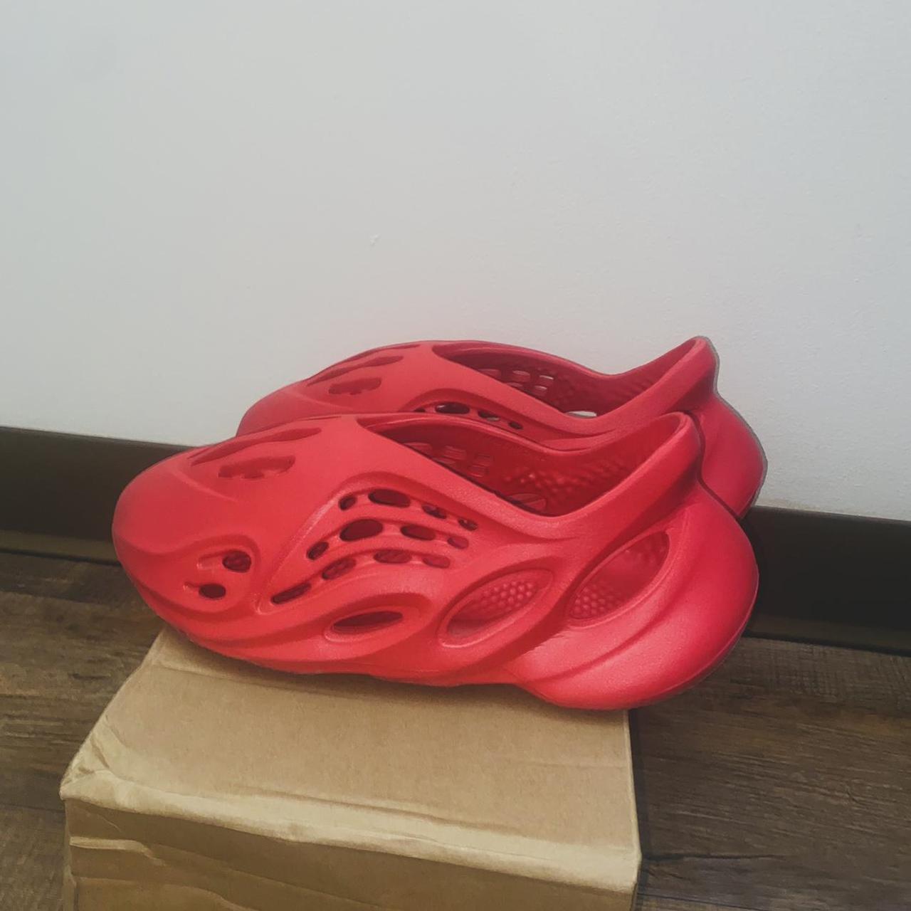 yeezy foam runners. red. condition 8.5/10 size... - Depop