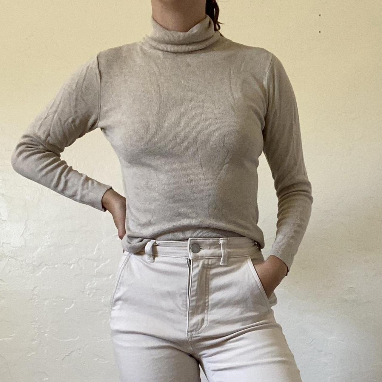 The perfect basic turtleneck in a creamy oatmeal