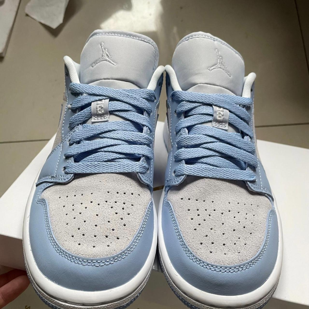 low top jordan 1s blue