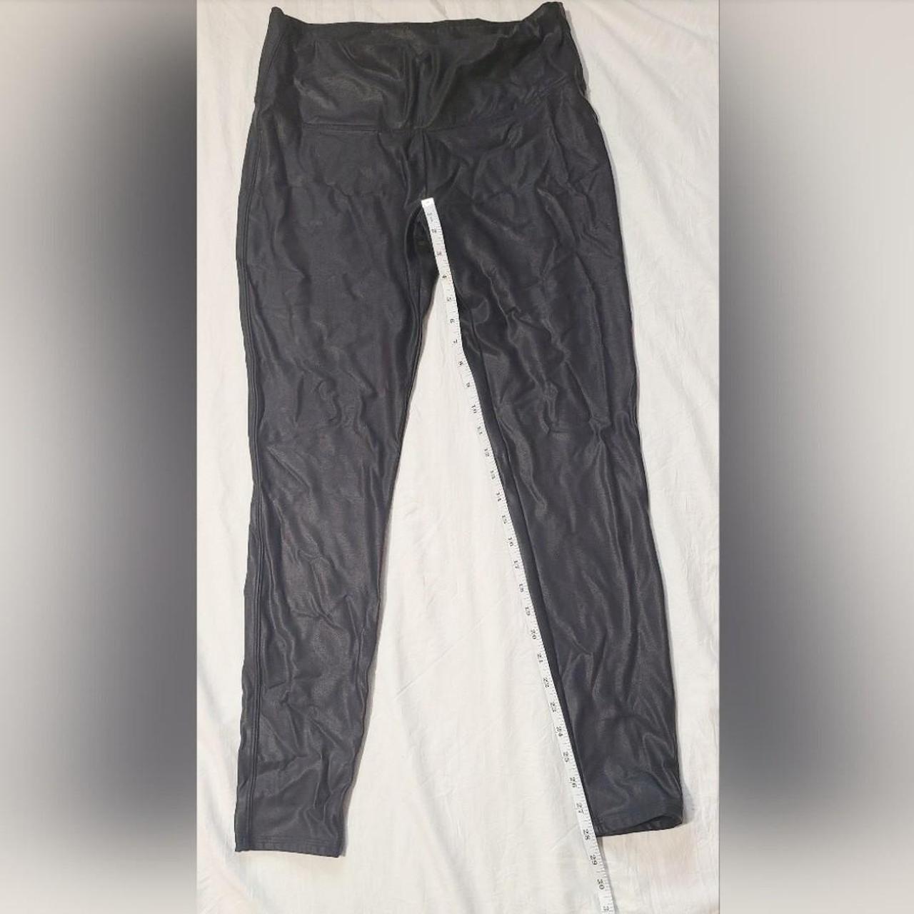 Time & Tru black faux leather legging, size L.