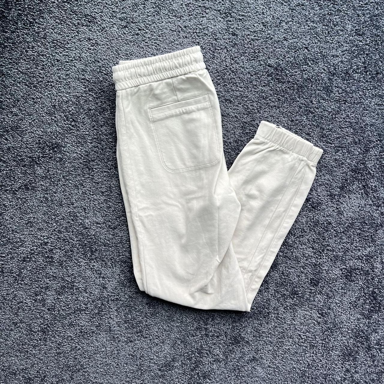 White Athleta casual athleisure joggers with zip - Depop