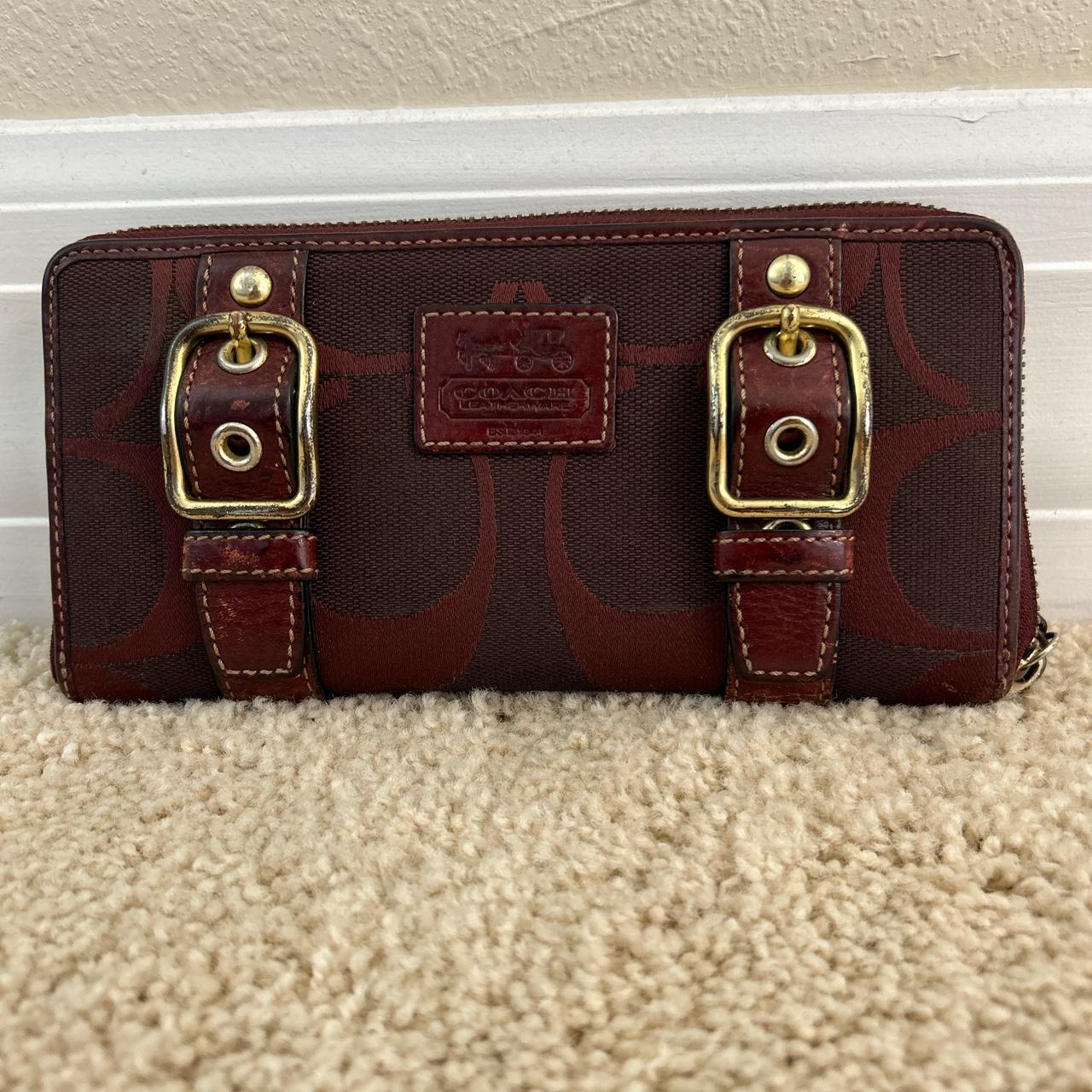 This vintage Coach wallet is older, but still in... - Depop