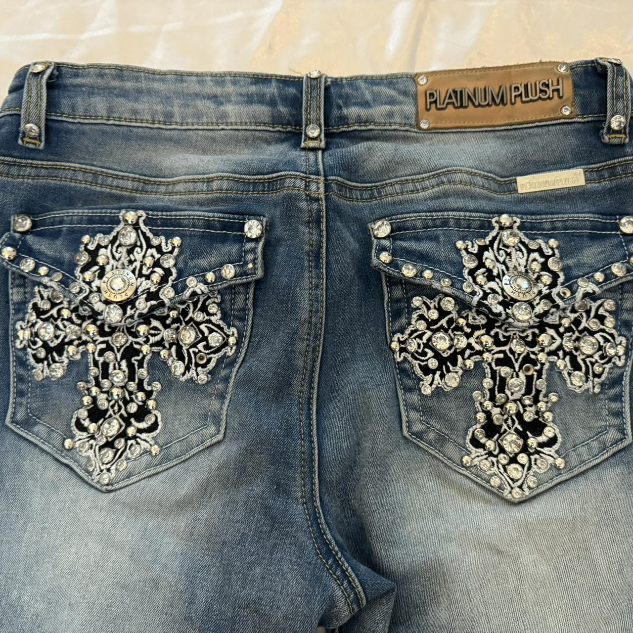 sick bedazzled cross mid rise flared jeans. so cute... - Depop