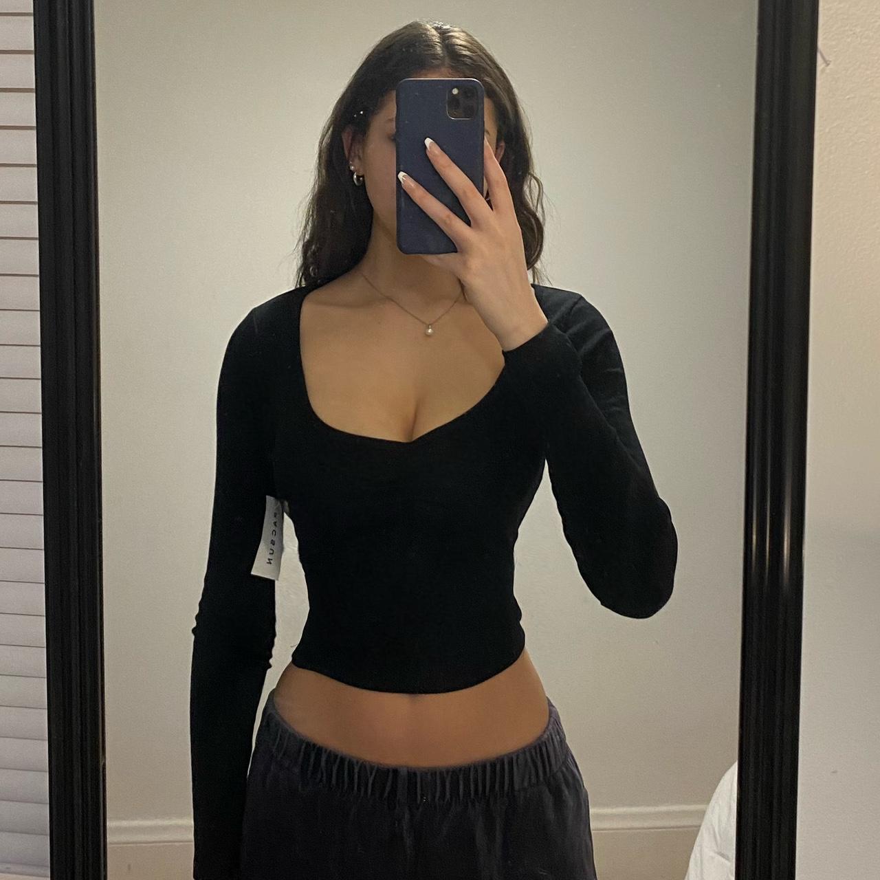 Black PacSun long sleeve top. Small cinch on chest.... - Depop