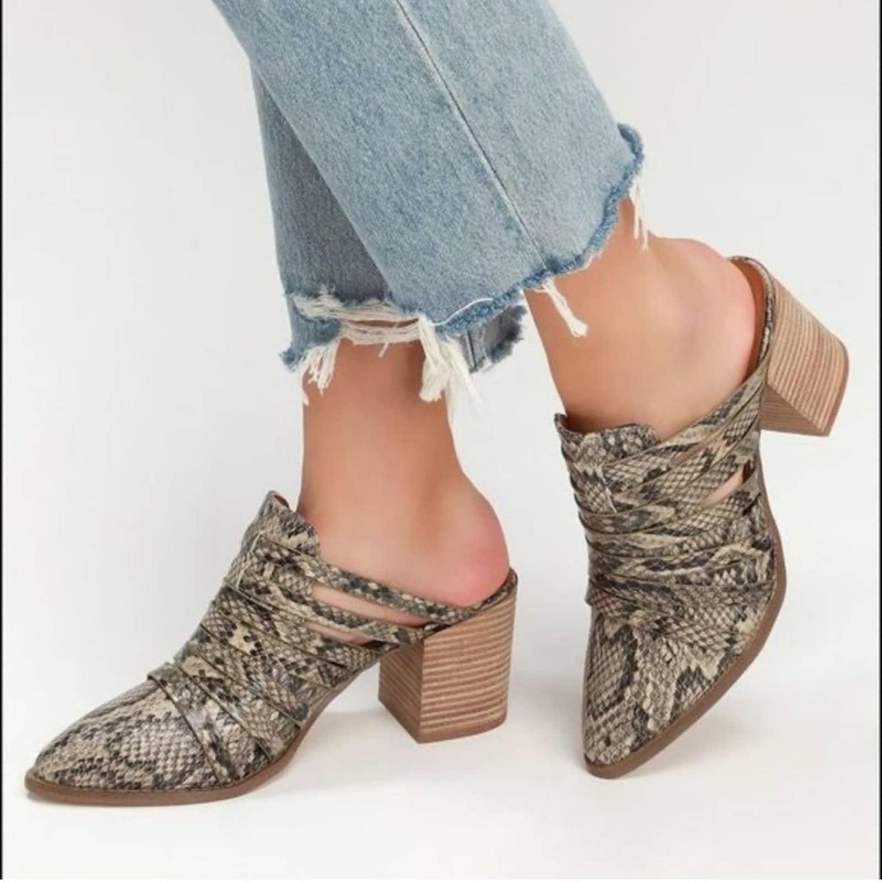 report tommy heeled mule