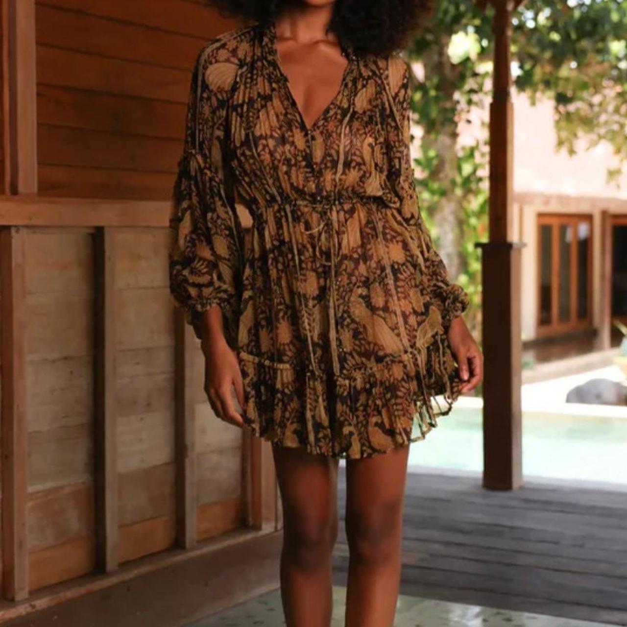 Tigerlily, Ophelia Fern in black mini dress,