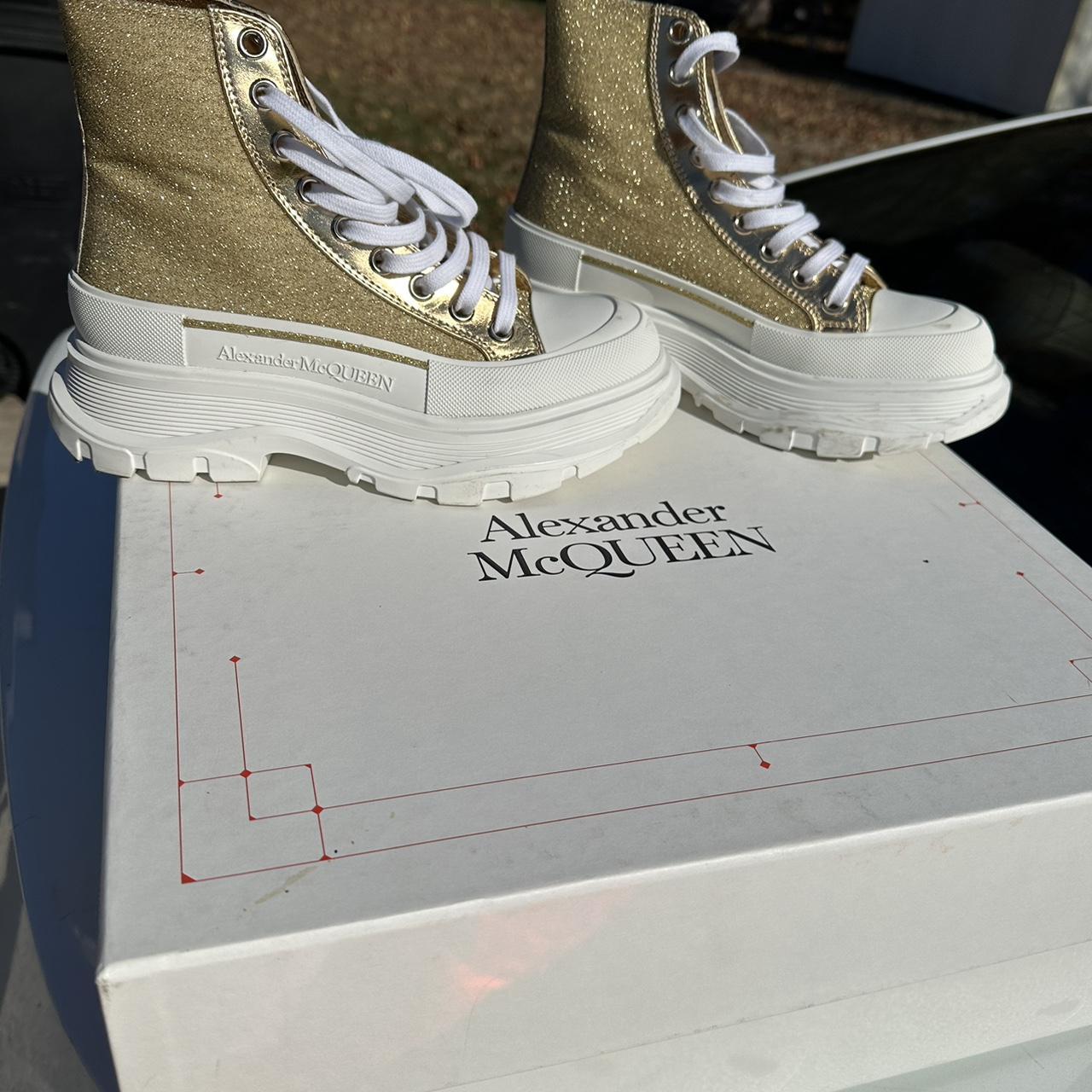 Alexander mcqueen cheap gold trainers