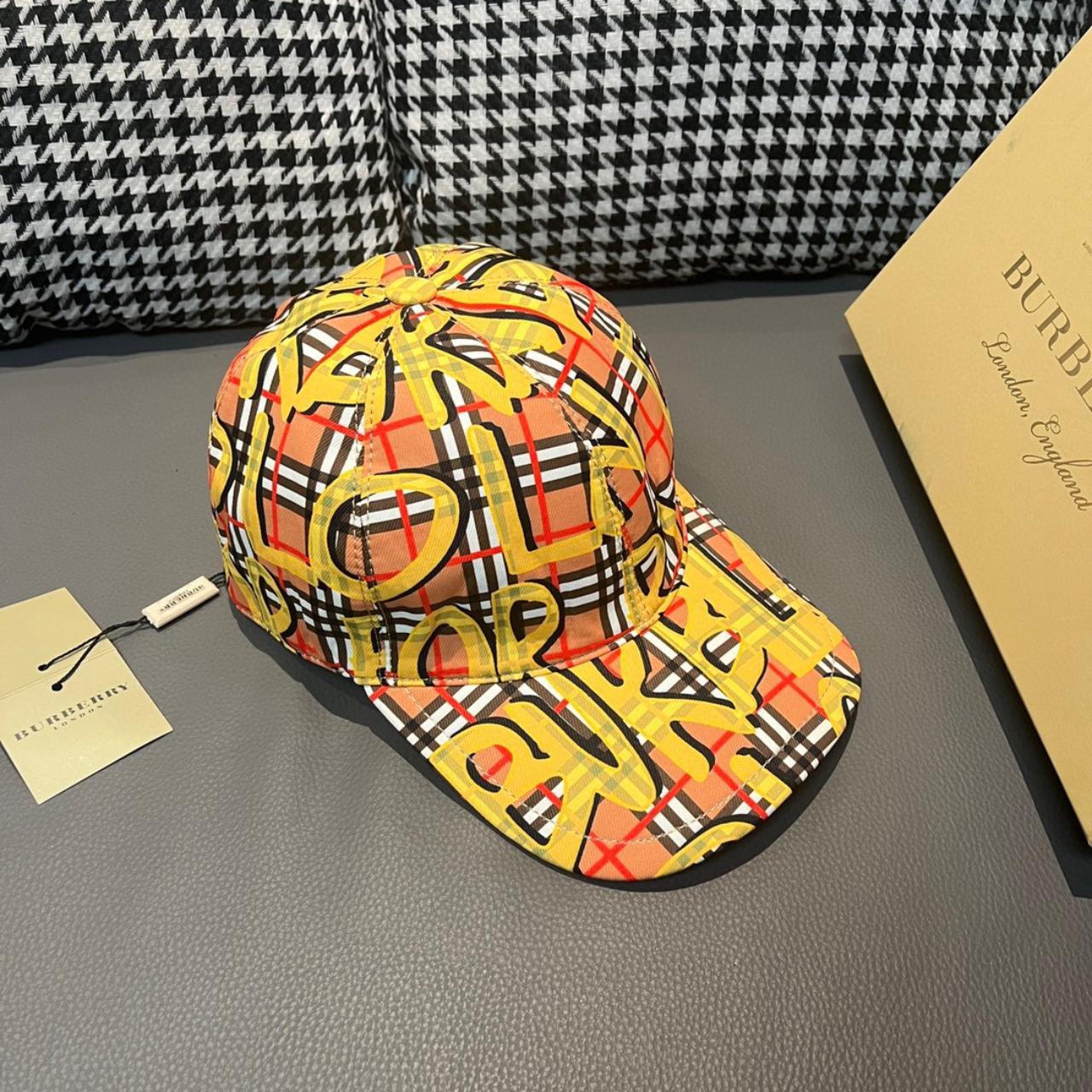 Burberry yellow fashion peaked hat | Depop