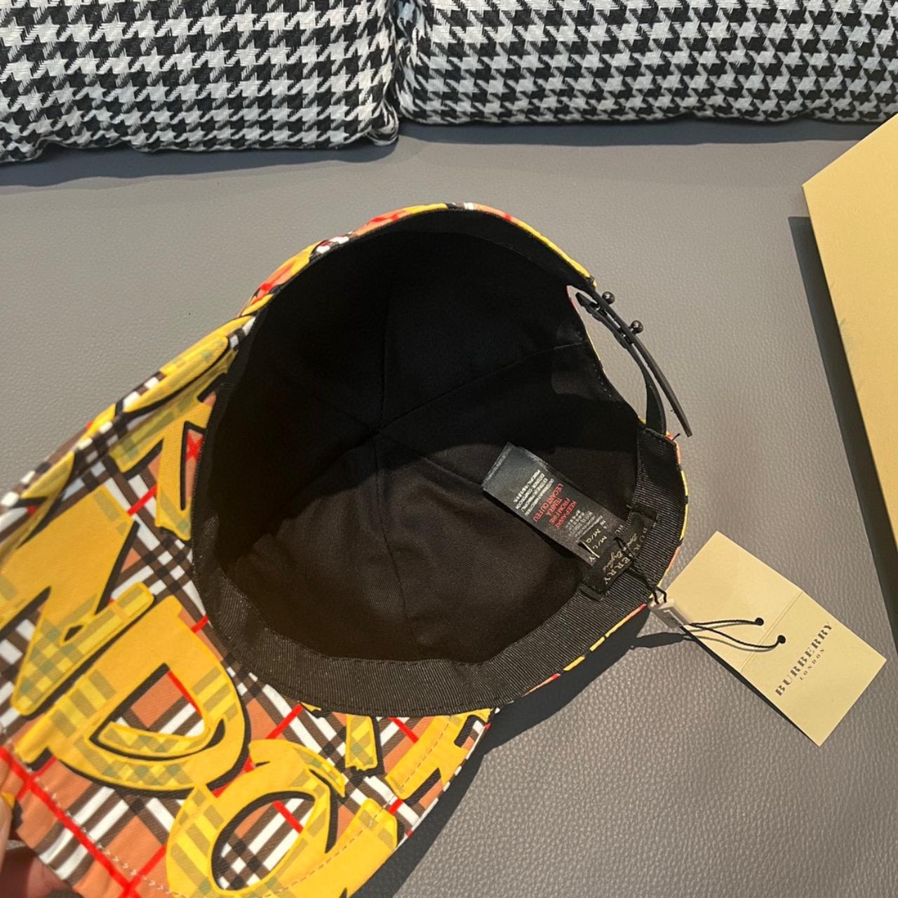 Burberry yellow fashion peaked hat | Depop