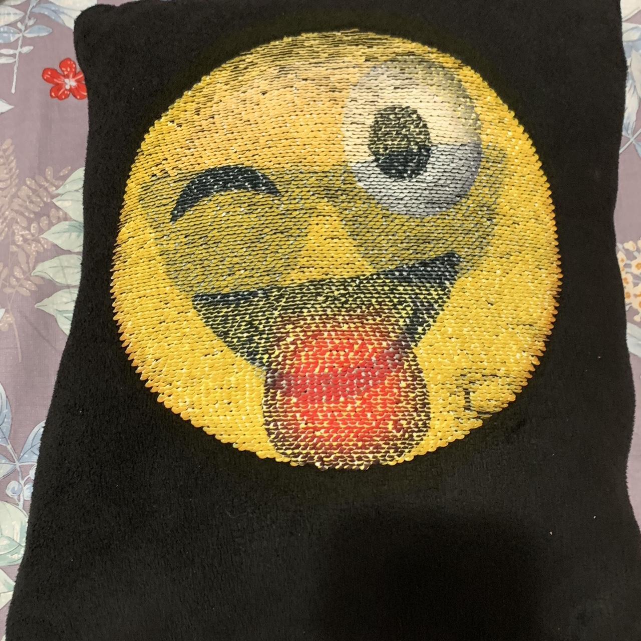 sequin emoji changing pillow. a little dirty but Depop