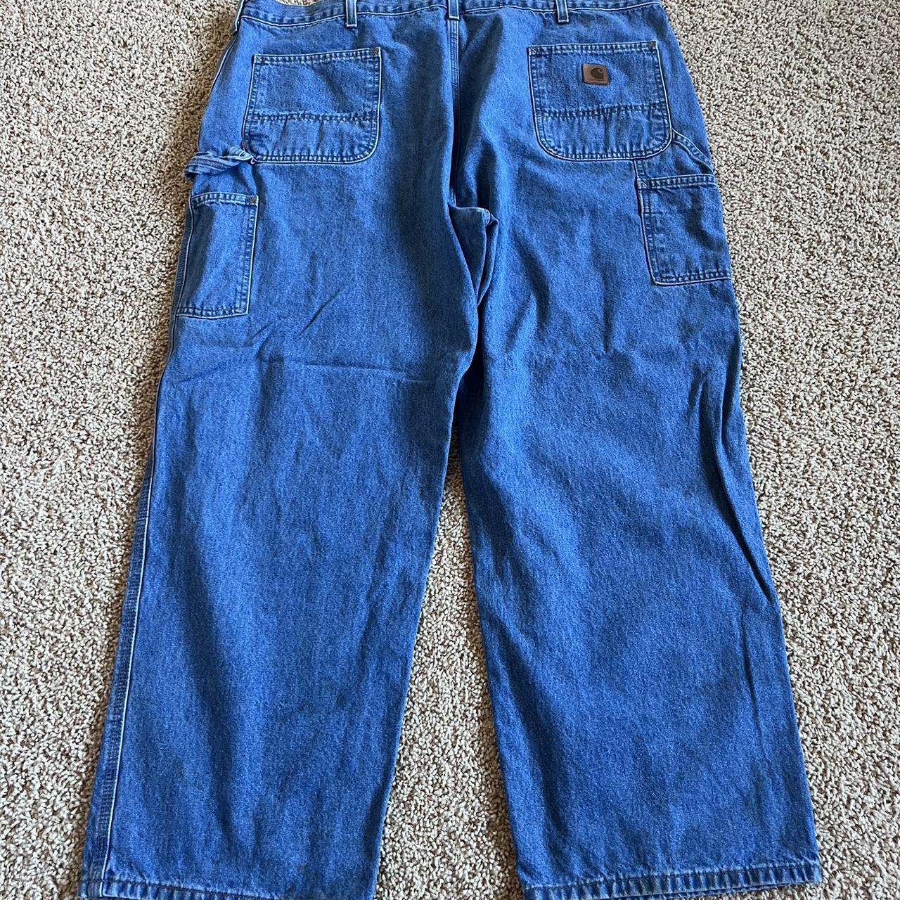 Baggy Carhartt Jeans 44 X 30 some noticable stains... - Depop