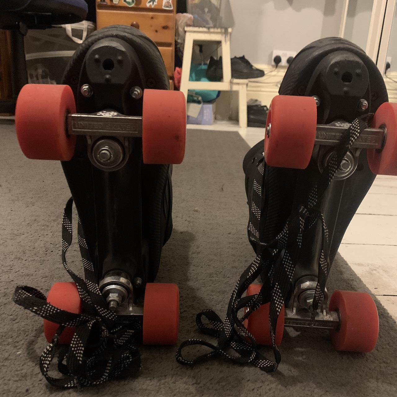 Black and red roller skates, in very good condition... - Depop