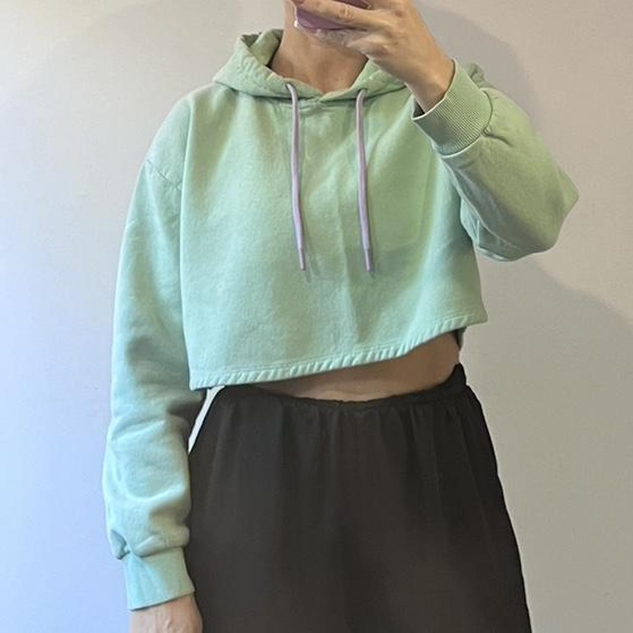 Primark mint green cropped hoodie with purple. Depop