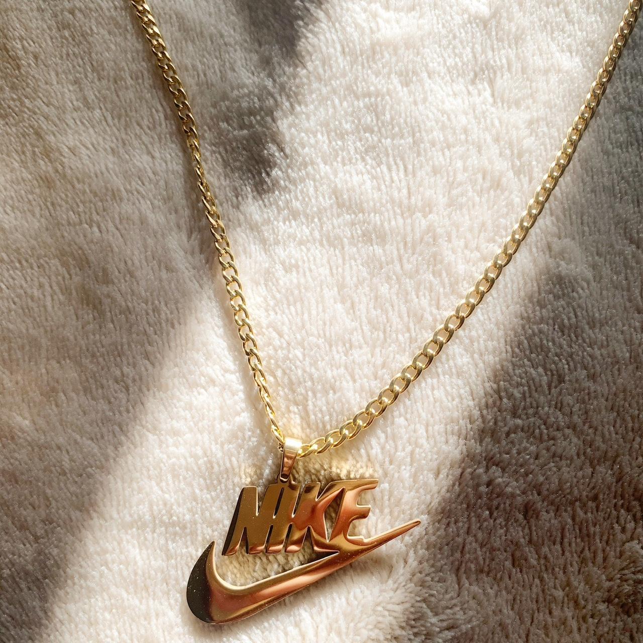 Nike gold tennis logo chain– JEMA - BORDUURSTUDIO