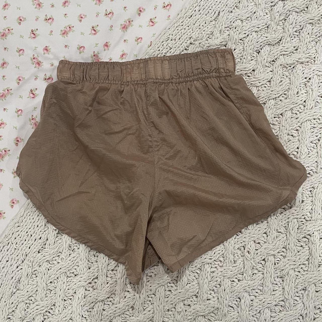 nike shorts black and gold
