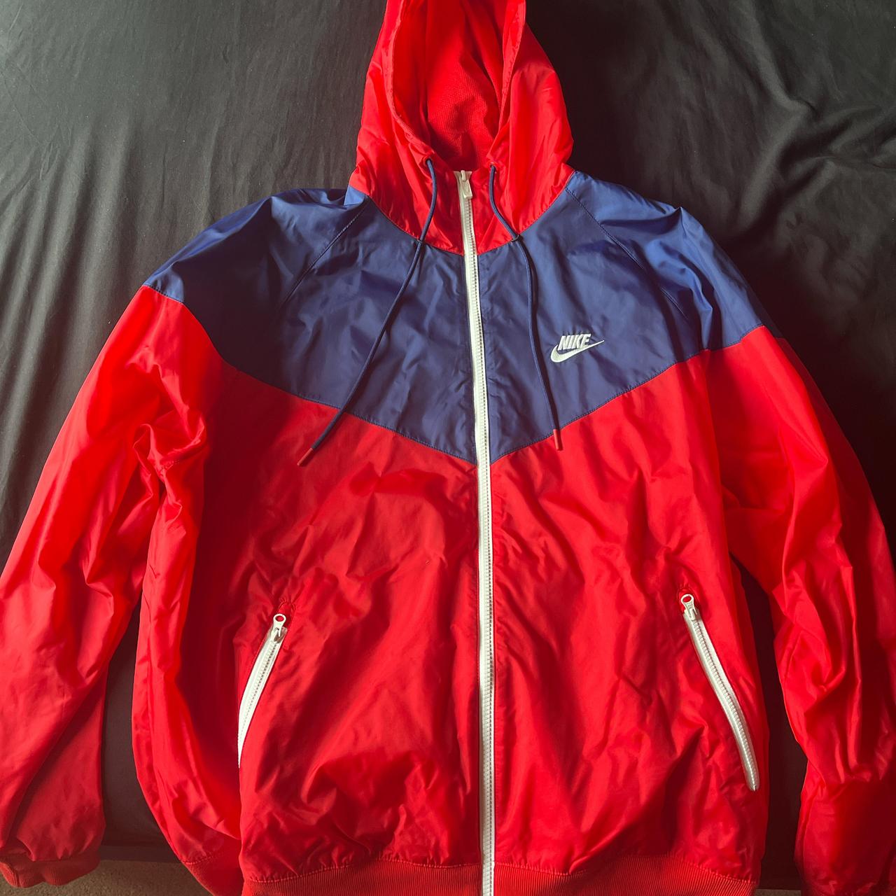 red and navy nike windbreaker
