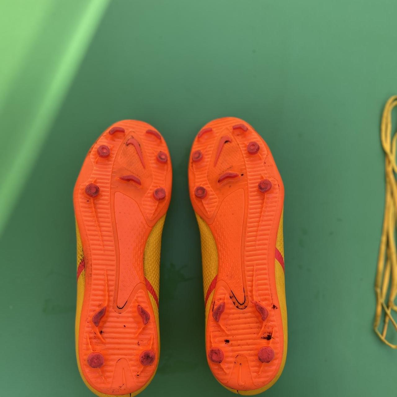orange and yellow nike football boots
