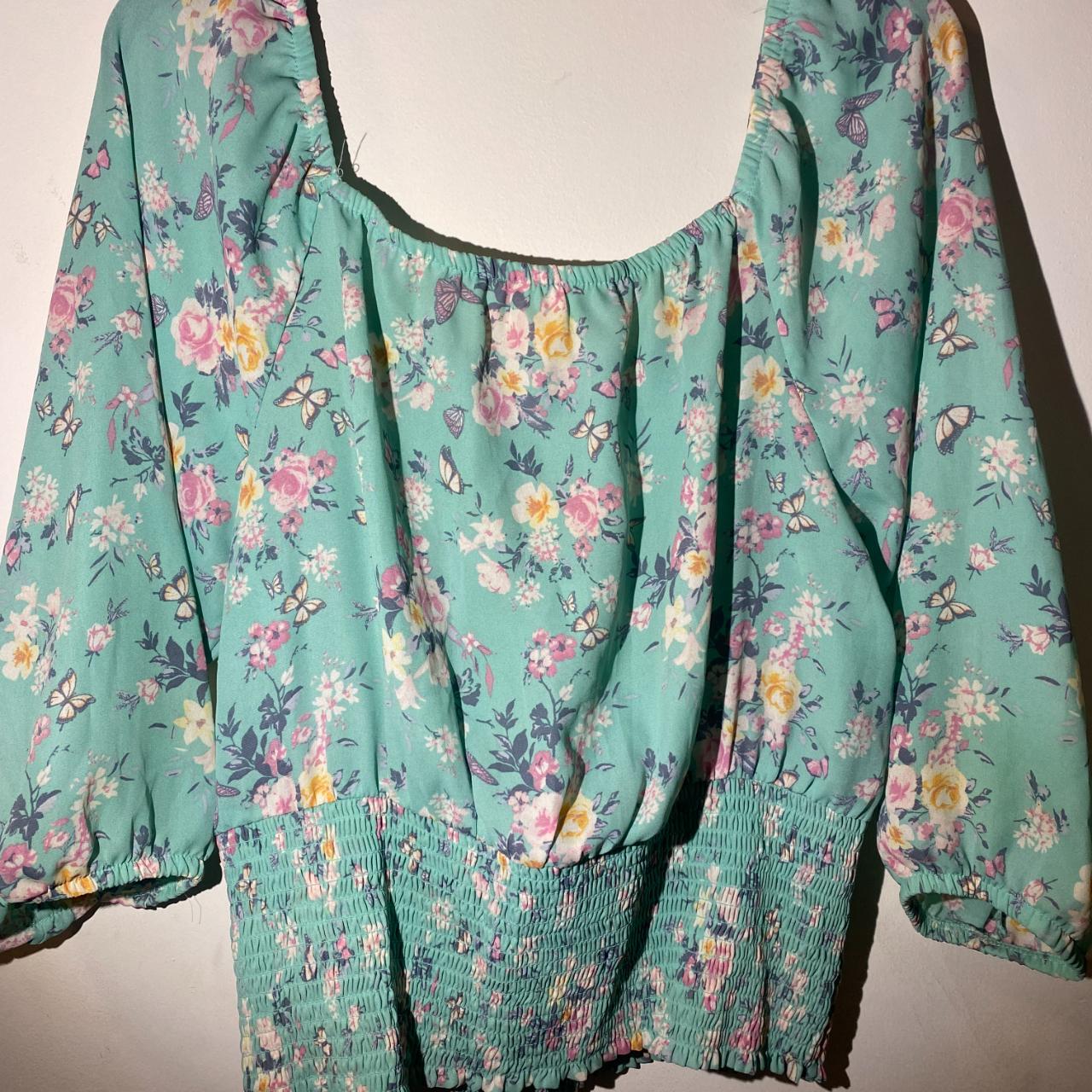 off the shoulder blouses with floral design and... - Depop