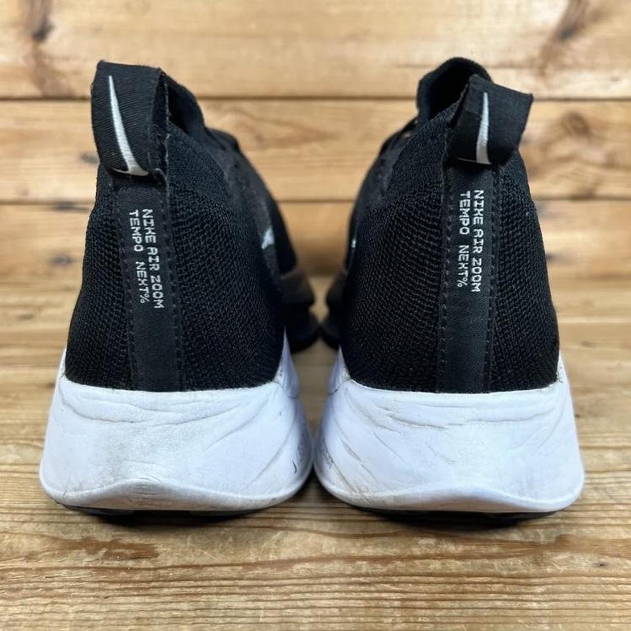 nike tempo all black