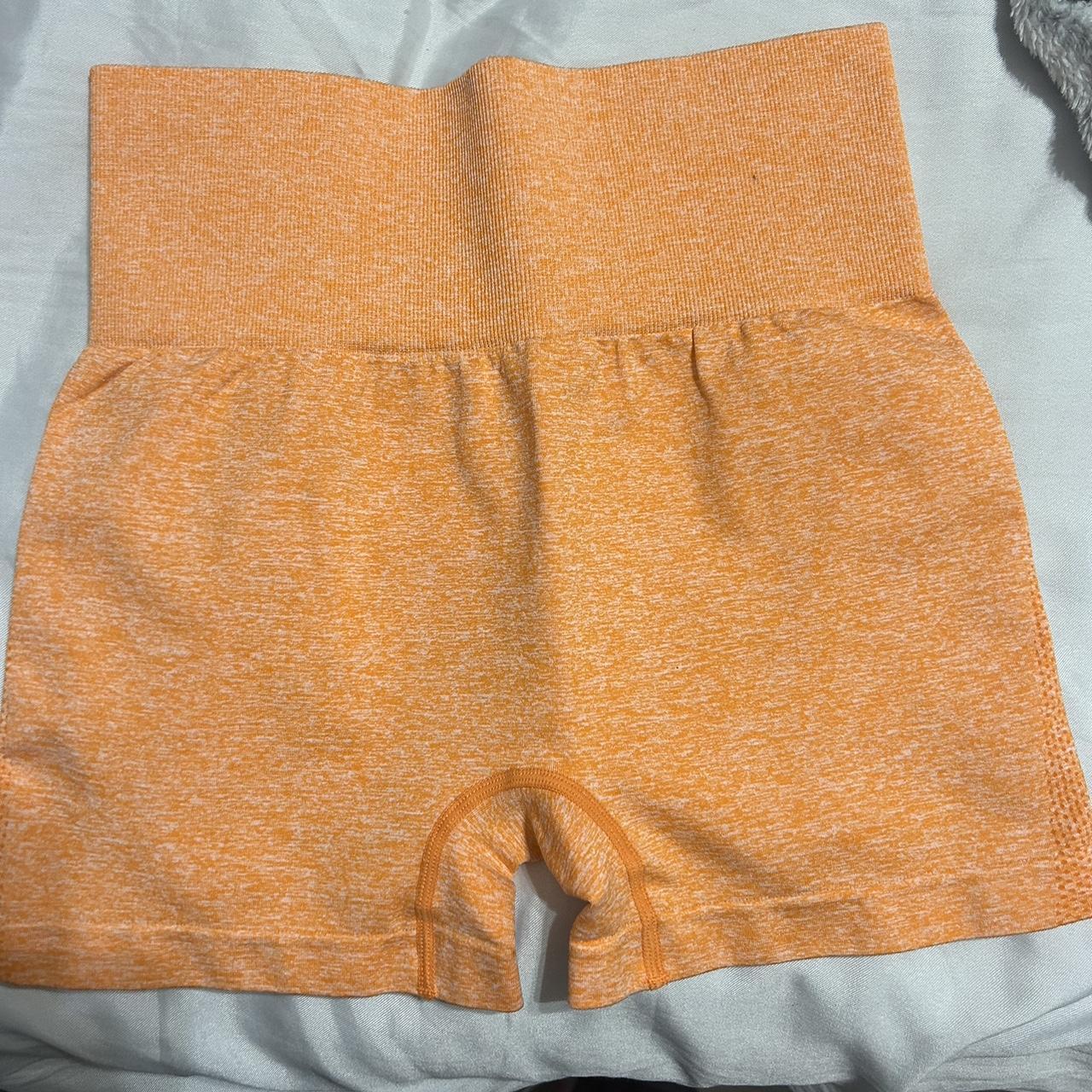 Small orange workout shorts never worn - Depop