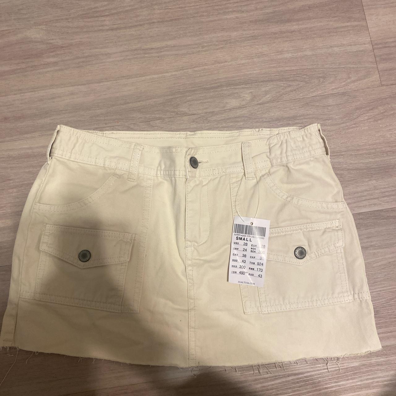 Cream denim brandy skirt , Fits like a medium , Never...