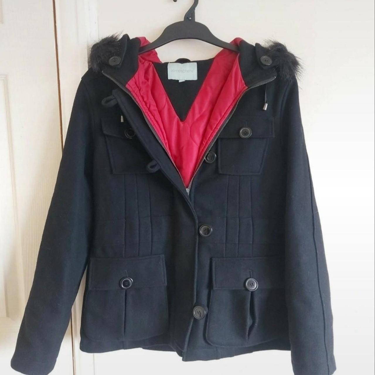 Black coat with red patch hotsell