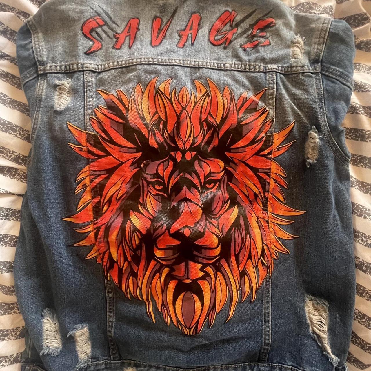 Denim jacket with store lion on back