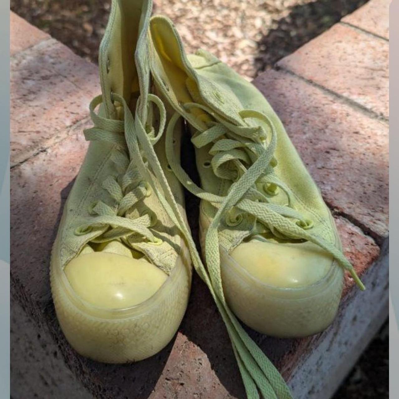 Neon yellow chuck Taylors with yellow gum sole. I