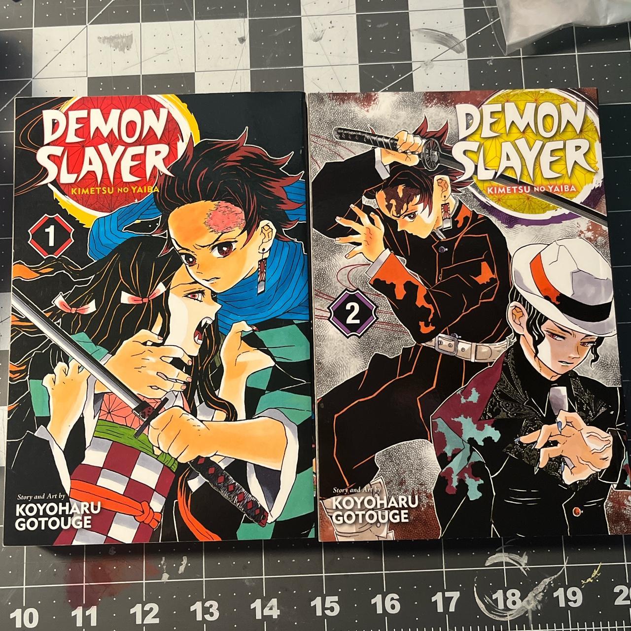 DEMON SLAYER VOL. 1&2 Vol. 1 one has a bit of... - Depop