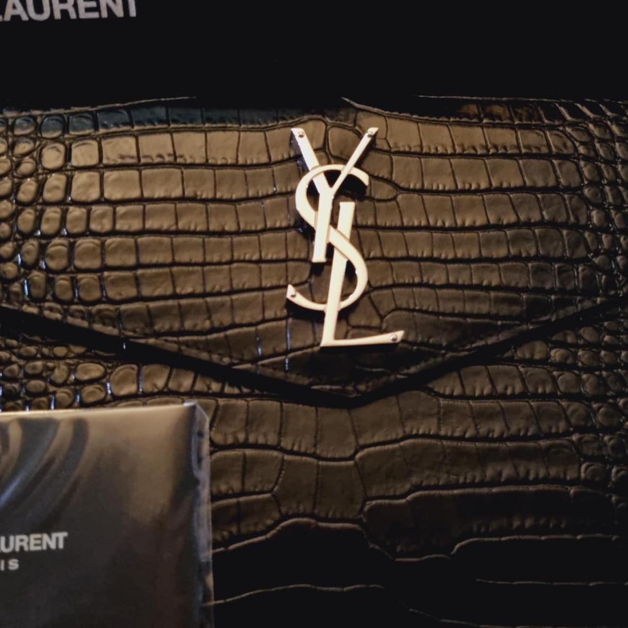 embossed leather saint laurent uptown baby pouch SAINT LAURENT 'Uptown' pouch with silver emblem Depop