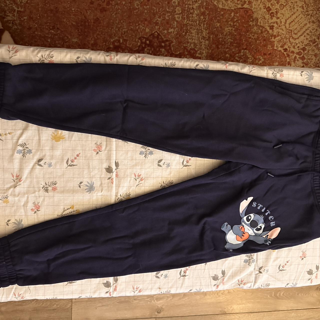 Disney Stitch joggers small size in good condition - Depop