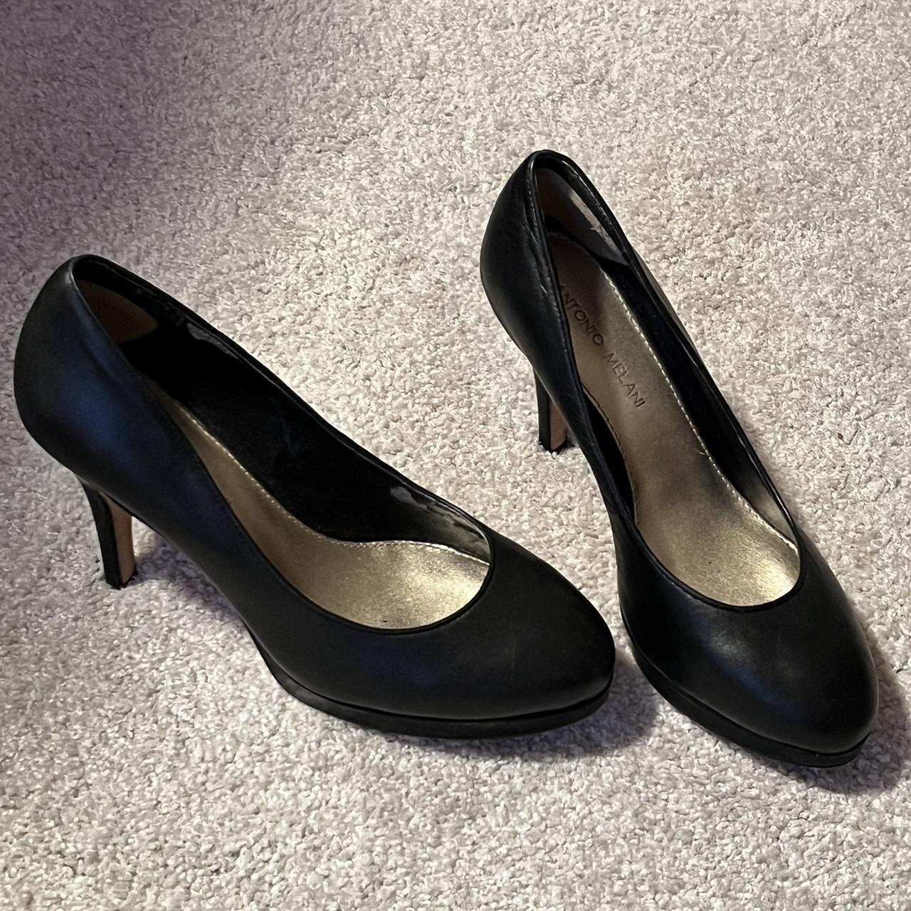 Black leather platform heels with a 3 inch