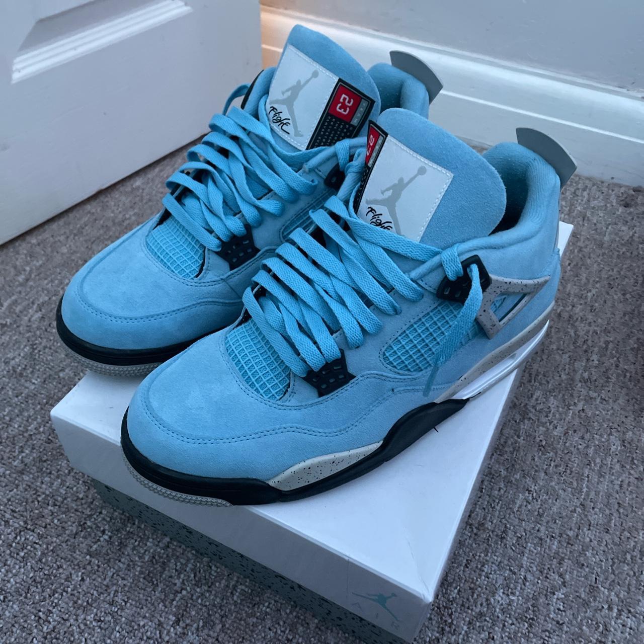 university blue jordan 4 white laces