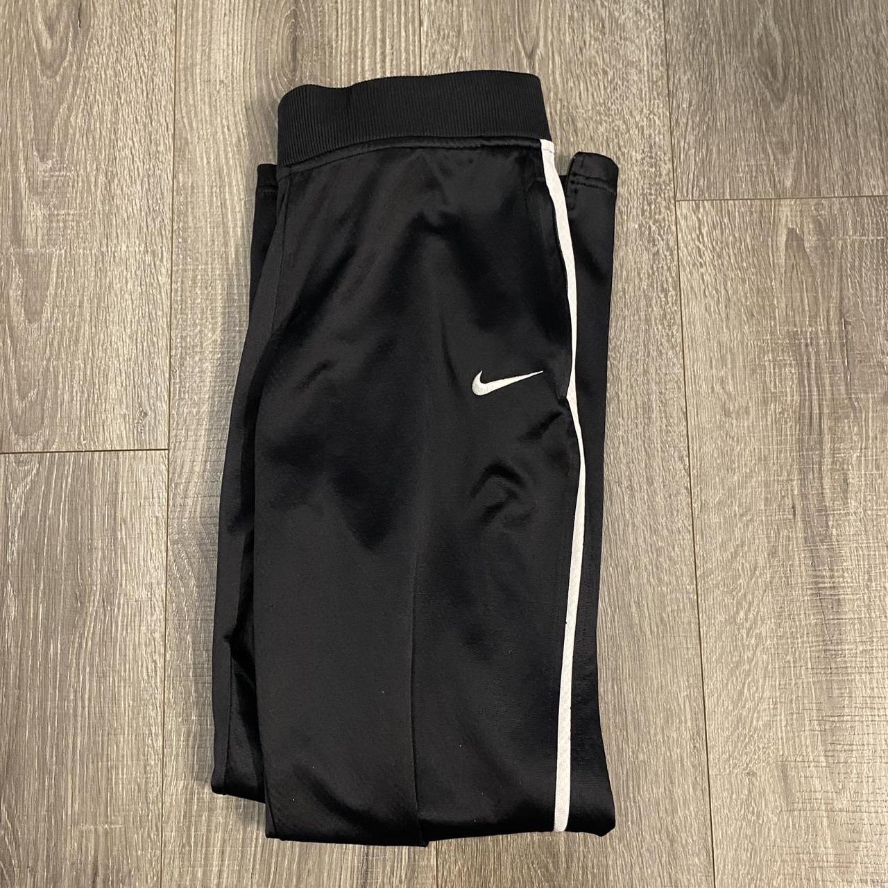 Nike sweatpants Pretty baggy fit more like a medium - Depop