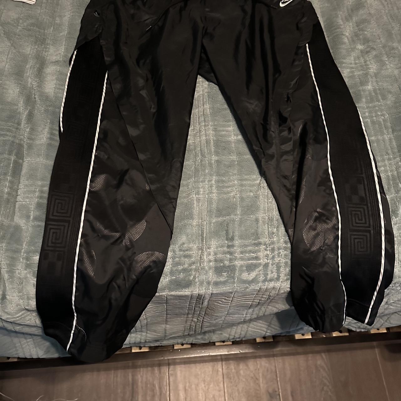 nike freak track pants