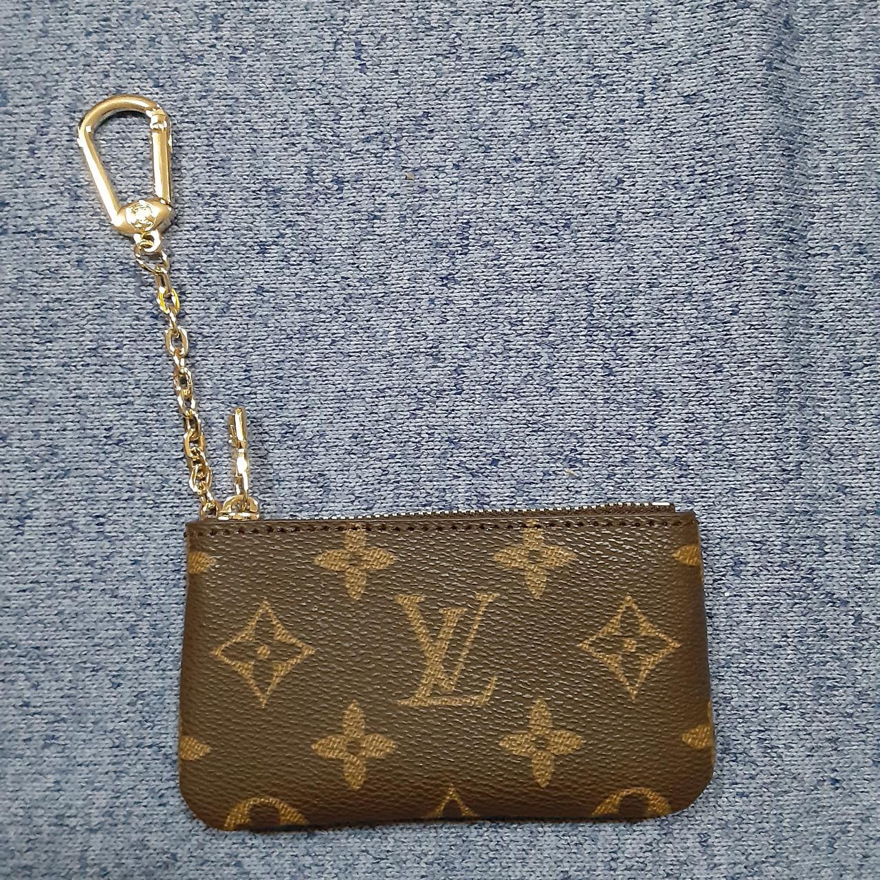 This is a LOUIS VUITTON Monogram Key Pouch. The Depop