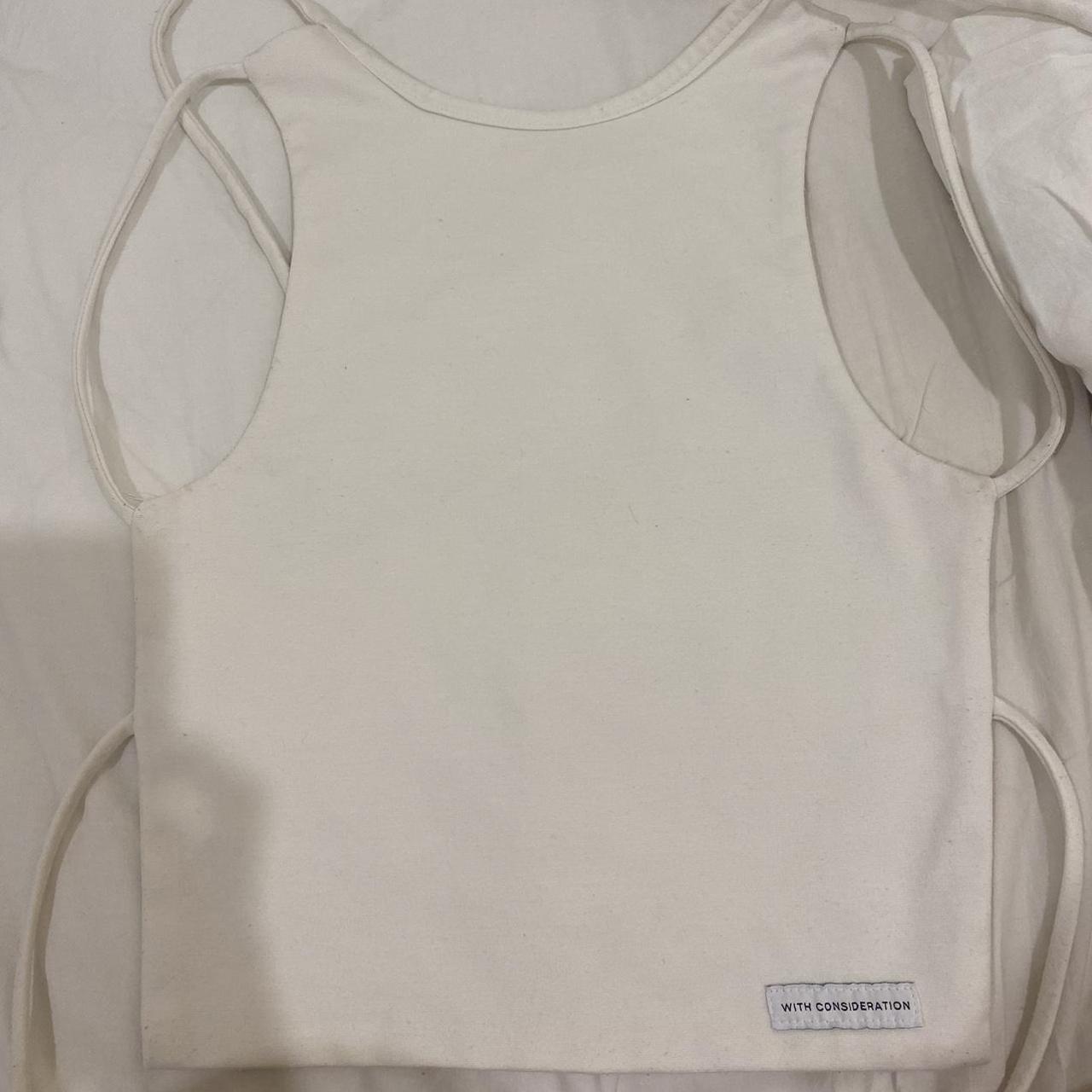 Pics of with consideration top - Depop