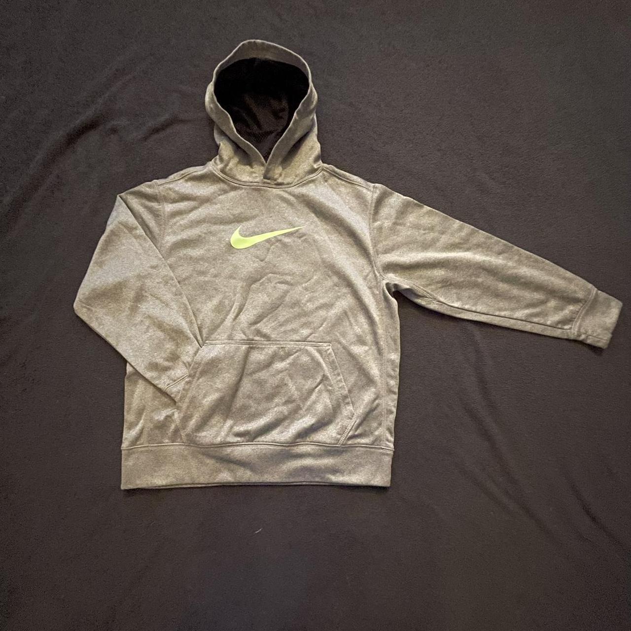 Grey Nike hoodie with a lime green Nike tick in the